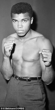 a black and white photo of a shirtless man