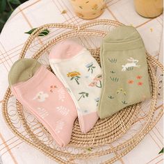 A set of 3 pairs of crew length socks featuring rabbits and flowers in a sweet pastel palette. Pink Sweet Socks For Spring, Cute Cotton Socks For Spring, Cute Green Socks For Spring, Spring Cotton Socks Gift, Spring Gift Cotton Socks, Cotton Socks For Spring Gift, Cute Soft Pink Socks, Pink Socks For Spring, Cute Pink Spring Socks