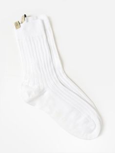 DESCRIPTION:A pair of wide-ribbed crew socks made from a soft cotton blend.FEATURES:Crew LengthKnit Fabrication78% Cotton, 22% Polyamide Comme Si Socks, Comme Si, Saint Bernard, Crew Socks, Scarlet, Capri, Cotton Blend, Socks