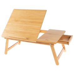 a wooden desk with a laptop on it's lap top and tray underneath the table