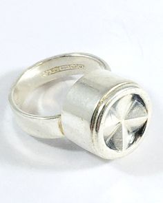 Modernist Silver Ring from Erik Granit, Helsinki Finland 1965. The ring has a top of 14mm in diameter. The ring size is 17.5 ( inner diameter ) , this is a US size 7.25 and Europe size 55. Hallmarks: EG / Designer Mark for Erik Granit Crown in Heart / Finland National Mark  813H / Silver Purity Mark  Boat / Helsinki City Mark  M7 / Finland Year Mark 1965 Please feel free to contact us for any further information. Free shipment worldwide. Upgrades are available on check out. The ring will be safe Modernist Anniversary Signet Ring, Vintage Wide Band Ring For Formal Occasions, Vintage Sterling Silver Wide Band Ring, Vintage Stamped 925 Dome Ring, Vintage Dome Ring Hallmarked, Handmade Modernist Gift Ring, Luxury Modernist Hallmarked Rings, Modernist Dome Ring With Polished Finish, Modernist Polished Signet Ring