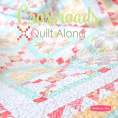 a close up of a quilt with the words cross road quilt along written in white