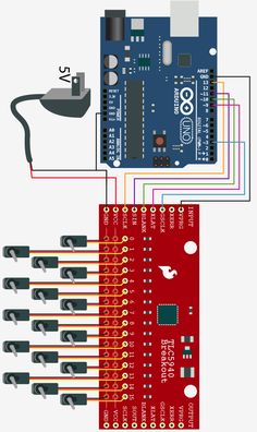 an electronic device with several wires connected to it and the other components attached to it