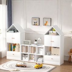 a child's playroom with toys and bookshelves in the shape of houses