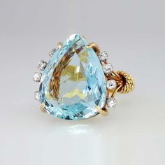 Fantastic 1960's ring made entirely in 18k yellow gold in pristine vintage condition. It features a natural aquamarine and is adorned by eight single cut diamonds Bijoux Art Deco, Bling Ring, Jewels Rings, Aquamarine Jewelry, Retro Jewelry, Bling Rings, Natural Aquamarine, Gorgeous Jewelry, Estate Jewelry