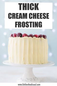 a frosted cake with raspberries on top and the words thick cream cheese frosting above it