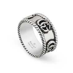 From Gucci, this ring is crafted in sterling silver with an aged finish that adds an antique quality to the overall design. This fashion ring features the iconic Gucci Marmont double G motif in an engraved twisted, torchon design that repeats all the way around the band. Engraved torchon trim is also seen all along the edges of the band that measures 0.35 inches in width. Made in Italy. Gucci Jewellery, Thick Ring, Gucci Jewelry, Gucci Gg Marmont, Gg Marmont, Charm Rings, Unisex Jewelry, Size 10 Rings, Bangles Jewelry