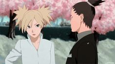 two anime characters standing next to each other in front of pink trees with leaves on them