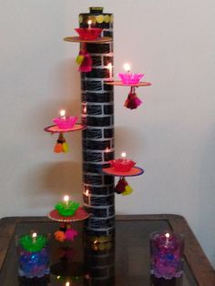 a decorative candle holder made out of wine bottles