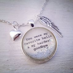 a necklace with a heart and an angel wing on it that says, you were my favorite hello & my hardest goodbye