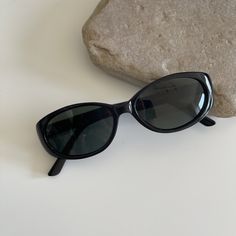 These round oval sunglasses are your everyday classic. Featuring a black frame with smoke lens. This style is unisex. True genuine vintage sunglasses from the 90s.  - 400 uv  - new vintage from the 90s - includes sunglasses pouch  Available in tortoise Doctor Halloween Costume, Black Oval Sunglasses, Sunglasses 90s, 90s Sunglasses, Sunglasses Pouch, Black 90s, Style Sunglasses, Vintage Sunglasses, Oval Sunglasses