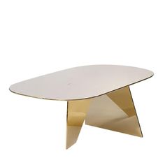 a white and gold coffee table on a white background