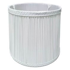 a white pleated lamp shade is shown on a white background, it looks like the inside of a cylinder