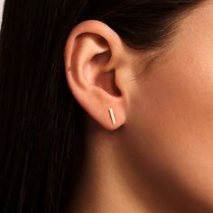 1- D E S C R I P T I O N Everyone needs to hear that the classics are timeless. So it's your time to wear our 14k gold bar earrings to always look stylish. If you wanna walk the way of elegance just gift yourself a pair of our bar earrings.  2- P R O D U C T ∙  F E A T U R E S * Gold material: 14K solid gold * Gold color options: Yellow gold, Rose gold, White gold * Dimensions: Earring width: 12 mm Earring length: 1 mm 3- D E L I V E R Y ∙ D E T A I L S We understand that you are looking forward Gold Bar Earrings Studs, Bar Earring, Gold For Women, Gold Bar Earrings, Studs Gold, Bar Studs, Minimal Jewelry, White Gold Earrings, Bar Earrings