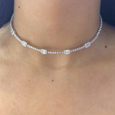 This exquisite choker necklace is crafted from 18Kt white gold and adorned with a total of 2.35 carats of diamonds. The diamonds are of G-H color and VS2 clarity, ensuring a dazzling brilliance and excellent quality. The necklace features both baguette and round cut diamonds, creating a beautiful and sophisticated design that elegantly complements any outfit. Luxury Diamond White Rectangular Necklace, Luxury White Gold Choker, Luxury Diamond Choker For Formal Occasions, Luxury Diamond Choker Jewelry, Luxury Silver Diamond Choker, Luxury Diamond Silver Choker, Formal Cubic Zirconia Diamond Choker Necklace, White Gold Diamond Choker For Wedding, Fine Jewelry White Gold Diamond Choker Necklace