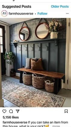 a bench with baskets and mirrors on the wall