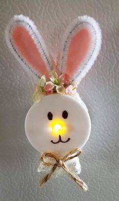 a light up bunny head hanging from the ceiling