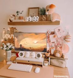 a desktop computer sitting on top of a wooden desk