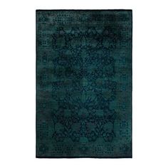 a blue rug with an intricate design on the front and back side, in dark green tones