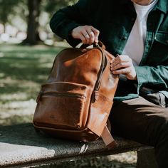 Classic, functional, distinctive. The Walker Leather Backpack checks all the boxes for life’s everyday journeys. Our universal dual-strap pack features premium leather and canvas material, uniting superior quality with timeless style. The primary compartment – accompanied by an easy-access external zipper pocket – offers an efficient storage design complete with laptop sleeve, sewn-in pouch with leather trim, and internal zipper pocket. No matter the place, no matter the plans... the Walker has Classic Leather Backpack With Smooth Grain For Everyday Use, Travel Leather Backpack With Vegetable Tanned Leather, Travel Leather Backpack With Vegetable-tanned Leather, Classic Satchel Backpack, Classic Waxed Finish Backpack, Travel Backpack With Vegetable Tanned Leather And Leather Lining, Classic Waxed Finish Standard Backpack, Classic Brown Leather Backpack With Waxed Finish, Classic Leather Satchel Backpack With Smooth Grain