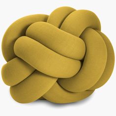 a circular object made out of yellow fabric