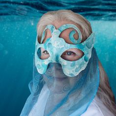 This Mermaid Sea-themed masquerade mask is bubbly and effervescent for an adventurous dip into a fantasy world. Ready to take the dive? A refined example of bubble painting, white bubbles with a touch of iridescence over a light blue-green aquamarine base coat, accented with deeper teals to add depth. Sealed with a professional-grade varnish, it is ready for a night on the town. Aquamarine satin ribbons allow for elegant yet secure wearing. The veil is securely glued to the bottom edge of the ma Mermaid Mask, White Masquerade Mask, Ball Costume, Horse Mask, Green Aquamarine, Theatre Masks, Bubble Painting, Costume Masks, Half Mask