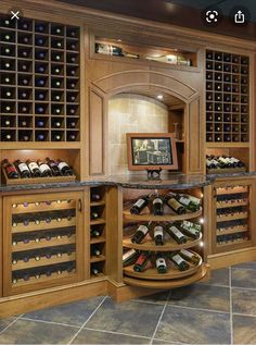 a wine cellar with lots of bottles in it