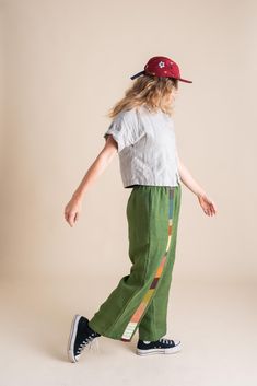 Stand out in our Patchwork Sunset Pants—a one-of-a-kind masterpiece crafted from a collection of cotton and linen fabric scraps we've carefully saved throughout the year. These unique pants are perfect for transitioning effortlessly between summer and fall, and back again. Stripe colors/fabrics will vary. Features: One-of-a-Kind Design: Each pair is a unique patchwork of carefully selected fabric scraps. Versatile Styling: Ideal for shifting seasons, blending summer ease with autumn warmth. Pull Wearable Sewing Projects, Between Summer And Fall, Jumpsuit And Cardigan, Unique Pants, Elastic Pants, Cardigan Tops, Skirt Leggings, Cotton Fleece, Cardigan Jacket