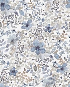 a blue and white floral wallpaper with lots of leaves on the top of it