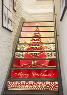 stairs decorated with christmas decorations and bows are painted on the side of each stair case