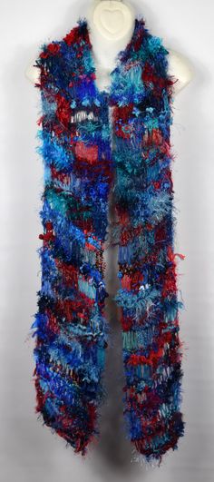 Scarf is knitted in drop stitch style Is highly textured Contains many different yarns Is 200cm long x 15cm wide Colors are red, blue and aqua Handknit Scarf, Drop Stitch, Handmade Scarf, Hand Knit Scarf, Multi Colored, Scarf Wrap, Crochet Projects, Red Blue, Hand Knitting