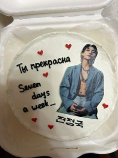 a cake decorated with an image of a man on it