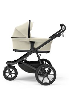 a white stroller with black wheels on a white background