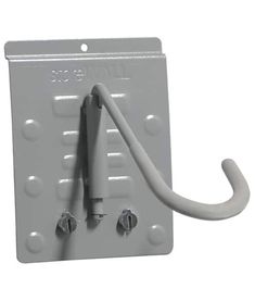 an electrical outlet attached to a wall with a hook and two white wires on it