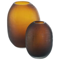 two brown vases sitting next to each other