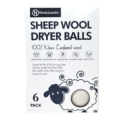 the sheep wool dryer balls are packaged in a white package on a white background