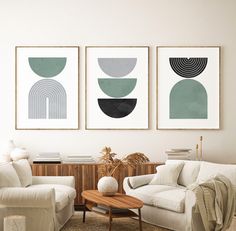 three framed art prints in a living room