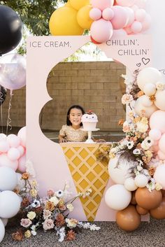 an ice cream themed birthday party with balloons