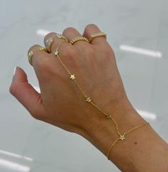 18k gold over brass Stars: 5mm  Bracelet: 6 inches Gold Hand Chain, Hand Chain Bracelet, Crystal Beads Bracelet, Gold Hand, List Ideas, Hand Chain, Fancy Jewelry, Gold Hands, Jewelry Inspo