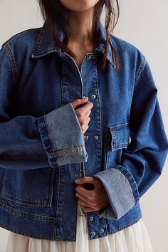 A twist on a tried-and-true, this staple denim jacket is featured in an effortless, oversized style with statement front pockets and longline cuffs. **Fit:** Oversized and boxy, semi-cropped **Features:** Collared neckline, button snap closure, long cuffs, large front pockets **Why We | Suzy Denim Jacket by Free People in Blue, Size: M Free People Denim Jacket, Denim Zip Up Jacket, Free People Jacket Outfit, Oversized Denim Jacket Outfit Women, Big Jean Jacket, Denim Jacket Design Ideas, Oversized Jean Jacket Outfit, Denim Jacket Outfit Women, Oversized Denim Jacket Outfit