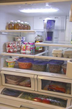 an open refrigerator filled with lots of food