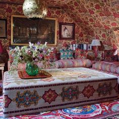 a living room filled with lots of colorful furniture