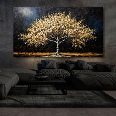 a living room with a large painting on the wall and a couch in front of it