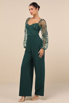 You'll strut your way into everyone's heart in the Lulus Darling Charisma Emerald Mesh Embroidered Jumpsuit! Elegant floral-embroidered mesh shapes a sweetheart neckline (with hidden no-slip strips) and long, sheer balloon sleeves (with elasticized shoulders and cuffs) that can be styled on or off the shoulders. The high, fitted waist tops crepe knit pants with a wide-leg silhouette and full-length hems. Hidden back zipper/clasp. Fit: This garment fits true to size. Length: Floor length. Size me Bridesmaid Celana, Bridesmaid Pantsuit, Lgbt Wedding Attire, Jumpsuit Outfit Wedding, Green Outfits For Women, Cocktail Attire For Women, Bride Jumpsuit, Jumpsuit For Wedding Guest, Olive Green Jumpsuit