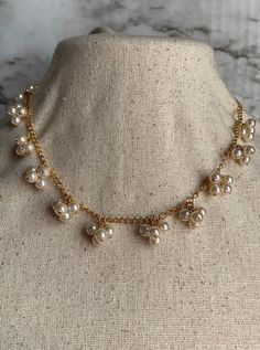 This beautiful Avon faux pearl necklace from the 1980's is in almost brand new condition and would make a perfect addition to any vintage lover's collection. There are no visible scratches or blemishes. The pearls are glass ad the chain is gold in color and 18 inches in length. Pearl Cluster Necklace, Pearl Cluster, Cluster Necklace, Faux Pearl Necklace, Vintage Avon, Vintage Lover, Gold Plated Chains, Cute Earrings, Leather Cord