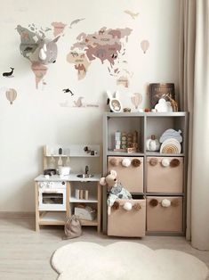 a child's playroom with toys and decor