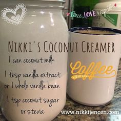 two coffee mugs sitting next to each other on top of a counter with the words, nikki's coconut creamer