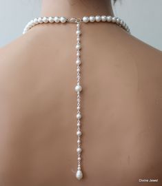 "Elegance meets sophistication with our Austrian pearl necklace, the perfect accessory for weddings and special occasions. Handcrafted with meticulous attention to detail, this necklace exudes timeless beauty and charm. Each lustrous pearl is carefully selected to ensure a radiant glow that complements any outfit. Whether you're walking down the aisle or attending a gala event, this necklace will add a touch of refinement to your ensemble. With its classic design and undeniable allure, our Austrian pearl necklace is a must-have for those seeking to make a statement on their special day. Embrace the magic of this exquisite piece and create memories that will last a lifetime. Austrian pearl necklace it's finished off with a lobster claw closure. It comes with the option of a backdrop or 2\" Bridal Necklace Pearl, Pearl Backdrop, Backdrop Necklace Wedding, Simple Pearl Earrings, Backdrop Necklace, Bridal Bracelet Pearl, Gala Event, Backdrops Necklace, Jewelry Classic