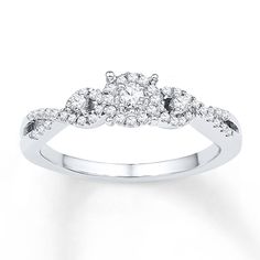 a white gold ring with diamonds on it