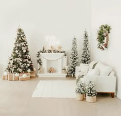 the living room is decorated with christmas trees